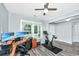 Well-lit home office featuring modern exercise equipment, light gray walls and wood look floors at 3941 Bessemer Rd, Mount Pleasant, SC 29466