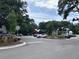 Community parking area with circle drive at 401 Oak Hammock Ct # 48, Johns Island, SC 29455