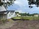 New construction homes featuring a farmhouse exterior style at 401 Oak Hammock Ct # 48, Johns Island, SC 29455