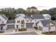 Charming new construction exterior with multiple garage spaces, gray doors and inviting curb appeal at 401 Oak Hammock Ct # 48, Johns Island, SC 29455