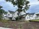 New construction homes featuring a farmhouse exterior style with covered back porches at 401 Oak Hammock Ct # 48, Johns Island, SC 29455