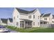 Elegant two-story home with a cozy screened-in porch and well-manicured lawn at 401 Oak Hammock Ct # 48, Johns Island, SC 29455