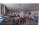 Open concept dining and kitchen area with natural light, modern appliances and easy access to living spaces at 401 Oak Hammock Ct # 48, Johns Island, SC 29455