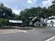 A peaceful street view showcasing the building exteriors and beautiful trees at 401 Oak Hammock Ct # 48, Johns Island, SC 29455
