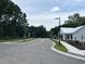 Picturesque street view highlighting community buildings, providing a sense of the neighborhood's layout and architectural design at 401 Oak Hammock Ct # 48, Johns Island, SC 29455