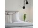 Bright bedroom with accent lighting and cozy bedding, showcasing a comfortable and stylish space at 42 Poinsett St, Charleston, SC 29403