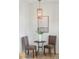 Cozy dining nook featuring stylish light fixture, table, and comfortable seating at 42 Poinsett St, Charleston, SC 29403