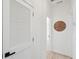 Hallway featuring wood floors and a view of the bathroom at 42 Poinsett St, Charleston, SC 29403