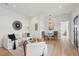 Inviting living room with light hardwood floors, modern furnishings, and ample natural light at 42 Poinsett St, Charleston, SC 29403