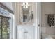 Well-lit bathroom features a vanity with white cabinets and fixtures plus natural lighting at 4213 Club Course Dr, North Charleston, SC 29420