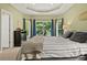 Bright bedroom featuring workout bike, large windows, and ample natural light at 4213 Club Course Dr, North Charleston, SC 29420