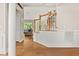 Welcoming foyer with hardwood floors, staircase, and views into the living room at 4213 Club Course Dr, North Charleston, SC 29420