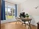 Inviting office space featuring hardwood floors, wainscoting, and a large window at 4213 Club Course Dr, North Charleston, SC 29420