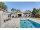 A pristine pool and patio highlight this beautiful backyard, ideal for relaxation and entertaining at 422 Palm St, Mount Pleasant, SC 29464