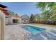 Inviting backyard featuring a pool, patio, green yard, and exterior view of the house at 422 Palm St, Mount Pleasant, SC 29464
