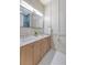 Modern bathroom with double vanity, stylish mirrors, and beautiful wainscoting at 422 Palm St, Mount Pleasant, SC 29464