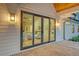 Exterior sliding glass doors open from the living room onto brick patio and outdoor space at 422 Palm St, Mount Pleasant, SC 29464