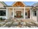 Charming entryway featuring a brick landing, covered entrance, and meticulous architectural detail at 422 Palm St, Mount Pleasant, SC 29464
