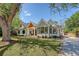 Elegant home with a well-manicured lawn, stylish windows, and a welcoming front entrance at 422 Palm St, Mount Pleasant, SC 29464