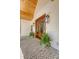 Inviting front porch with herringbone brick floor and wood-trimmed double doors at 422 Palm St, Mount Pleasant, SC 29464