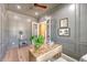 Sophisticated home office with gray paneling, a custom wood desk, and hardwood floors at 422 Palm St, Mount Pleasant, SC 29464