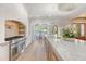 Bright kitchen features a large island, dining area, and modern stainless steel appliances at 422 Palm St, Mount Pleasant, SC 29464