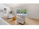 Inviting living area with comfortable seating, natural light, and a view of the pool at 422 Palm St, Mount Pleasant, SC 29464