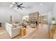 Spacious living room with high ceilings, brick fireplace, and hardwood floors at 422 Palm St, Mount Pleasant, SC 29464
