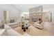 Spacious living room with exposed brick fireplace, hardwood floors, and open to a modern kitchen at 422 Palm St, Mount Pleasant, SC 29464