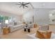 Bright living room boasts hardwood floors, high ceilings, and stylish furnishings throughout at 422 Palm St, Mount Pleasant, SC 29464