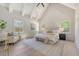 Bright and airy main bedroom with vaulted ceilings, hardwood floors, and large windows at 422 Palm St, Mount Pleasant, SC 29464