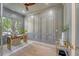Gray paneled office features hardwood floors, a modern desk, and a stylish bar cart at 422 Palm St, Mount Pleasant, SC 29464
