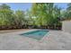 Backyard with a well-maintained pool, beautiful landscaping, and green yard at 422 Palm St, Mount Pleasant, SC 29464