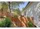 A wooden privacy fence encloses the side yard of this home, ensuring peace and seclusion at 422 Palm St, Mount Pleasant, SC 29464