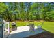 Backyard patio with a stainless steel grill and comfortable seating, perfect for outdoor entertaining at 474 Woodspring Rd, Mount Pleasant, SC 29466