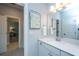 Bright bathroom with a large mirror, vanity, and modern fixtures at 474 Woodspring Rd, Mount Pleasant, SC 29466