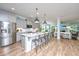 Spacious kitchen with large island, stainless appliances, and view to the living room at 474 Woodspring Rd, Mount Pleasant, SC 29466