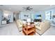 Bright living space with two sofas and an area with a desk and computer setup at 474 Woodspring Rd, Mount Pleasant, SC 29466