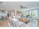 Bright and airy living room showcasing the open floor plan with hardwood flooring at 474 Woodspring Rd, Mount Pleasant, SC 29466