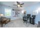 Home office with a ceiling fan, neutral walls, and a black office desk at 474 Woodspring Rd, Mount Pleasant, SC 29466