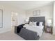 Comfortable main bedroom featuring neutral decor, a large bed, and an ensuite bathroom at 488 Queenview Ln, Charleston, SC 29414