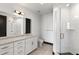 Modern bathroom featuring white cabinets, a shower, and a marble countertop at 5 Gadsdenboro St # 503, Charleston, SC 29401