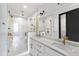 Modern bathroom featuring double vanity, and marble-and-gold finishes at 5 Gadsdenboro St # 503, Charleston, SC 29401