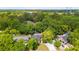 A neighborhood has mature trees and various home styles in this aerial view at 5 S Basilica Ave, Hanahan, SC 29410