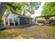 Spacious backyard showing rear of home with outdoor living space and entertainment area at 5 S Basilica Ave, Hanahan, SC 29410