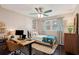 Comfortable bedroom with desk, chair, bed and neutral colors at 5 S Basilica Ave, Hanahan, SC 29410