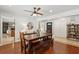Dining area with wood floors, a modern light fixture, and access to other living spaces at 5 S Basilica Ave, Hanahan, SC 29410