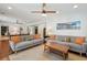 Spacious living room featuring hardwood floors, neutral decor, and comfortable seating at 5 S Basilica Ave, Hanahan, SC 29410