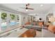 Cozy living room with access to the pool area through French doors at 5 S Basilica Ave, Hanahan, SC 29410