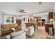 Spacious living room with kitchen island, open floor plan, and tile flooring at 5 S Basilica Ave, Hanahan, SC 29410